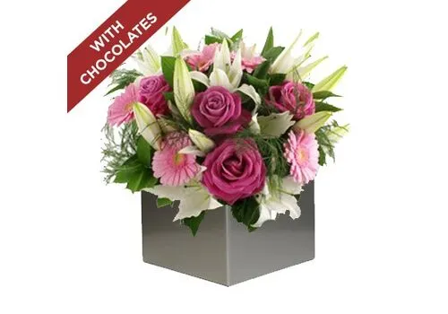 Rose, Gerbera And Lily Arrangement With Chocolates