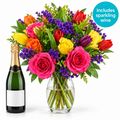 Beautiful bright bunch and a bottle of sparkling wine