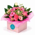 Box of beautiful fresh mixed pink blooms