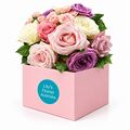 Beautiful mixed pastel roses set in a box