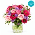 Our favourite flowers roses and gerberas set in a lovely keepsake vase