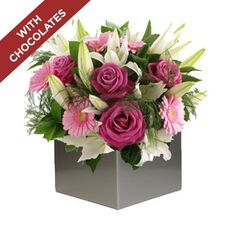 Rose, Gerbera And Lily Arrangement With Chocolates