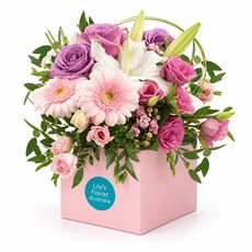 A stunning mix of fresh pastel blooms set in a box for ease of care
