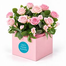 Mixed pastel roses set in a pretty box