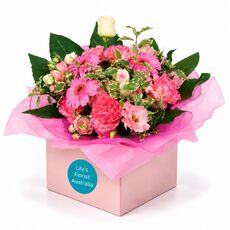 Box of beautiful fresh mixed pink blooms