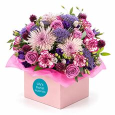 Mixed purple and lilac blooms set in a box