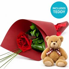 Cute and romantic. The best of both worlds with this single wrapped rose and teddy bear