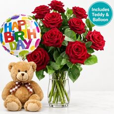 The full birthday package with 12 red roses and a teddy and balloon