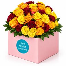 Stunning display of mixed fire coloured roses designed to impress