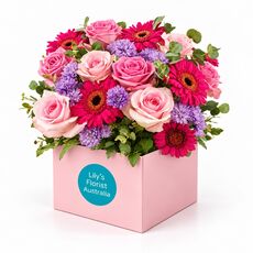 Stunning roses and gerberas set in a lovely box