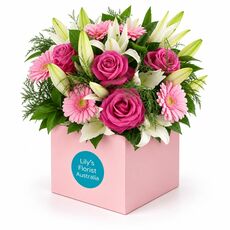 Roses, gerberas and beautiful lilies all set in a stunning box