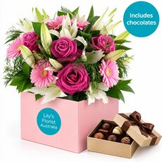 Roses, Gerbera and Lilies set in a box with box of chocolates