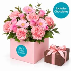 Roses and carnations with chocolates set in a box