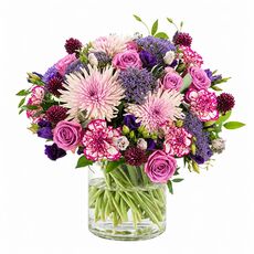 purple and lilac fresh flowers arranged in a bunch