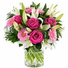 Roses gerberas and lily in a pastel bunch