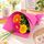 3 bright mixed gerberas wrapped and presented as a bunch