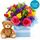 Beautiful fresh mixed flowers set in a box with a teddy for a boy