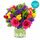Bright bunch of mixed blooms with glass vase