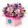 Mixed purple and lilac blooms set in a box