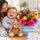 Flowers for a baby boy set in box with a cute teddy bear