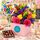 Birthday flowers with balloon and chocolates