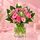 Pretty pink mix of fresh blooms wrapped in paper