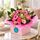 Stunning pink fresh blooms arranged in a boxed arrangement