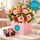 Blush pink mixed blooms in a box with a box of chocolates