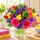 Bright bunch including a glass vase
