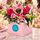 pink lily and roses in a box