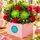red mixed flowers in a box arrangement