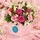 roses, gerberas and lily in a box