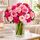 Roses and carnations in a glass vase