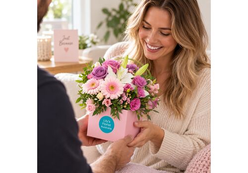 Arrangment in a box of beautiful pastel blooms