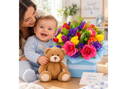 Flowers for a baby boy set in box with a cute teddy bear