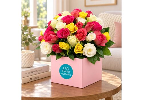 Mix of fresh beautiful roses in a boxed arrangement