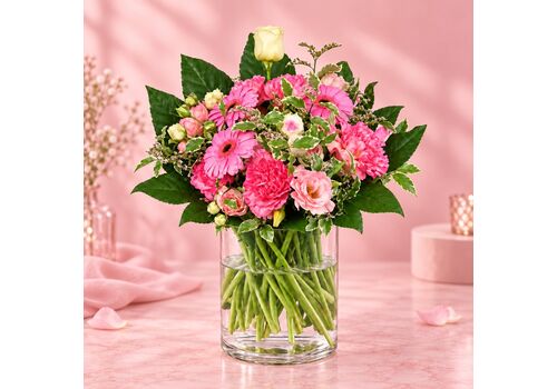 Pretty pink mix of fresh blooms wrapped in paper
