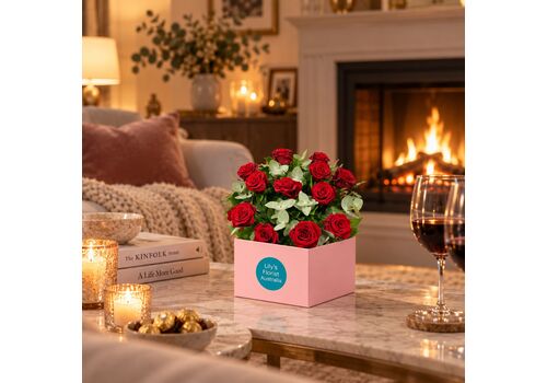 12 fresh red roses set in a box
