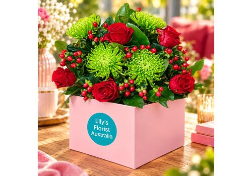 red mixed flowers in a box arrangement