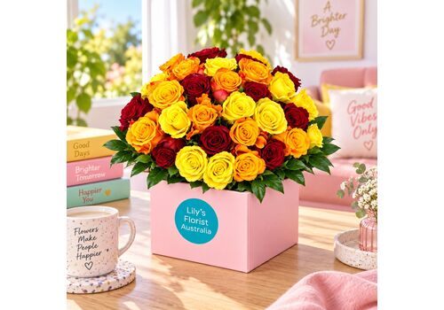 Rose fire red orange yellow roses in a boxed arrangement
