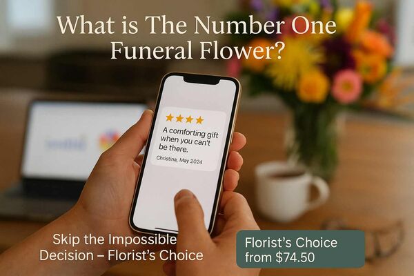 Close-up photo of hands holding a phone showing a five-star review about funeral flowers, with blurred colorful bouquet in background and CTA text Skip the Impossible Decision Florist’s Choice from $74.50 Close-up photo of hands holding a phone showing a five-star review about funeral flowers, with blurred colorful bouquet in background and CTA text Skip the Impossible Decision Florist’s Choice from $74.50